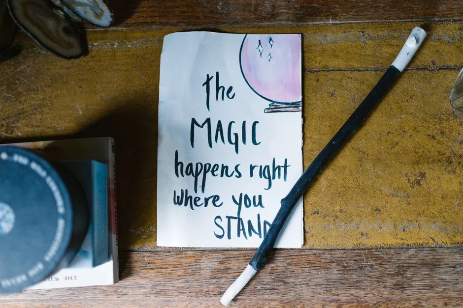 An inspiring quote on magic and belief with a wand, perfect for spiritual and mystical themes.
